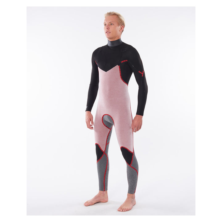 A male model wearing a black mens dawn patrol 5/3mm chest zip wetsuit inside out. View of the front